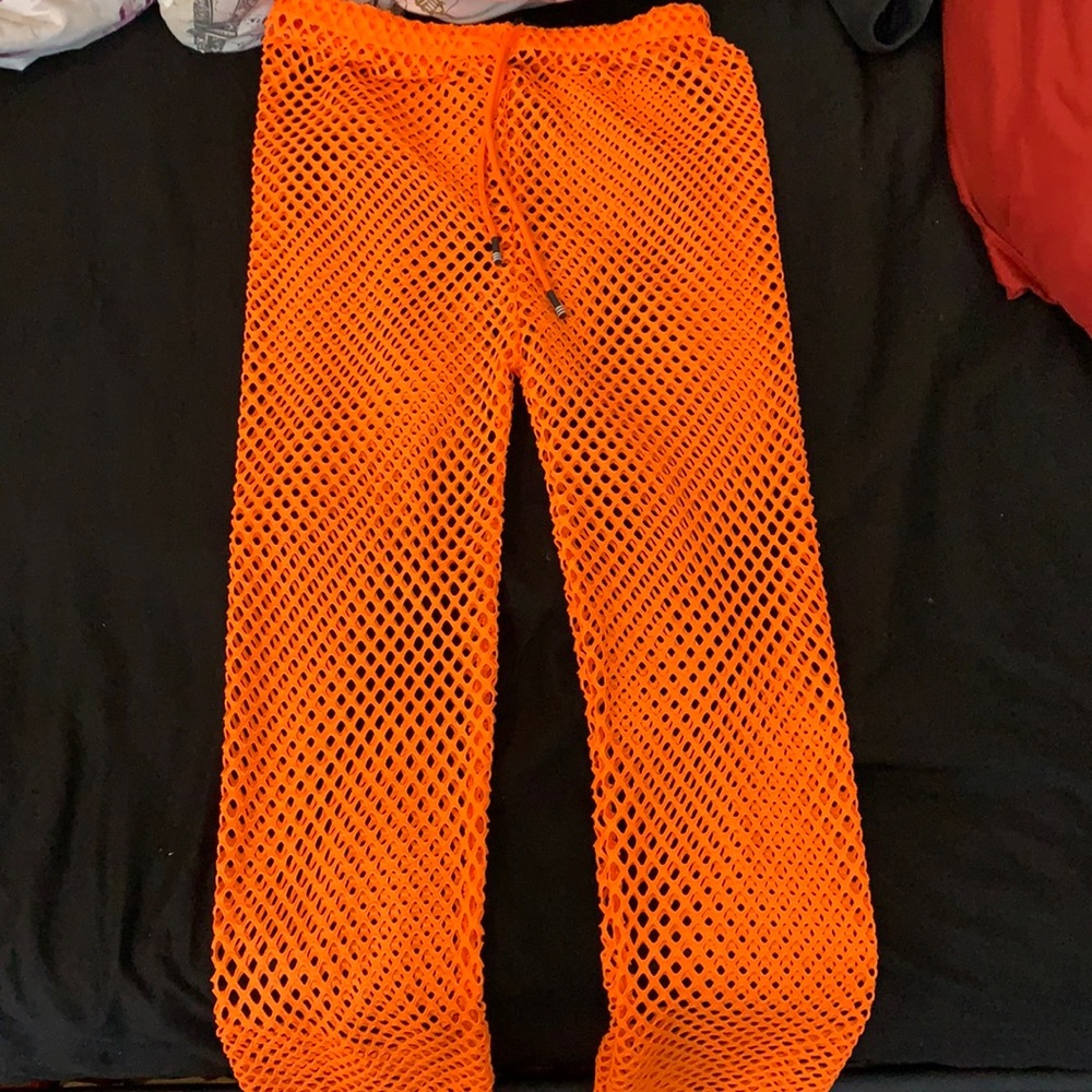 Netted orange pants, one size fits all, bathing suit cover